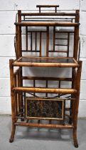 An early 20th century Chinese bamboo hall stand, the raised back having a single shelf above the top