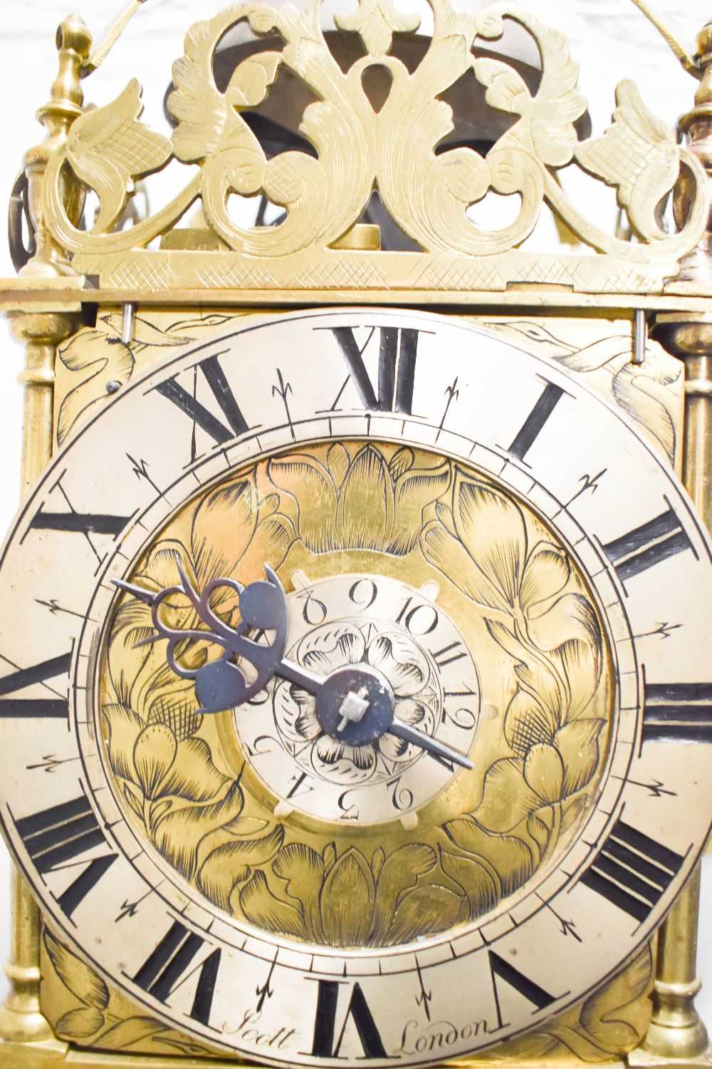 An 18th century Scott of London brass lantern clock, the Roman numeral chapter ring bordering a - Image 7 of 16