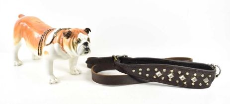 A vintage leather bulldog collar and lead together with a Lomonosov porcelain Bulldog figure, 15cm