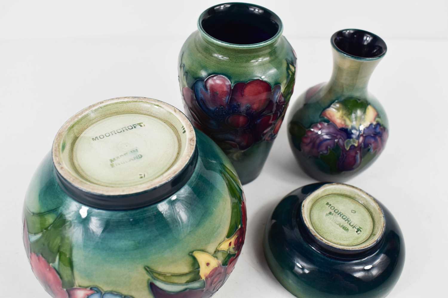 A group of Moorcroft pottery to include two small bud vases, and two bowls, all stamped Moorcroft, - Image 2 of 2