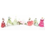 A group of seven Royal Doulton porcelain figurines comprising of Clarissa HN2345, Buttercup