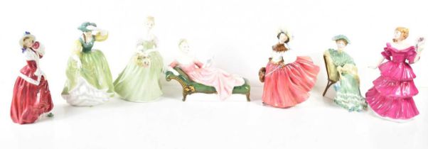 A group of seven Royal Doulton porcelain figurines comprising of Clarissa HN2345, Buttercup