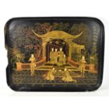 A 19th century Chinese black lacquered tray, gilded decoration throughout depicting courtly