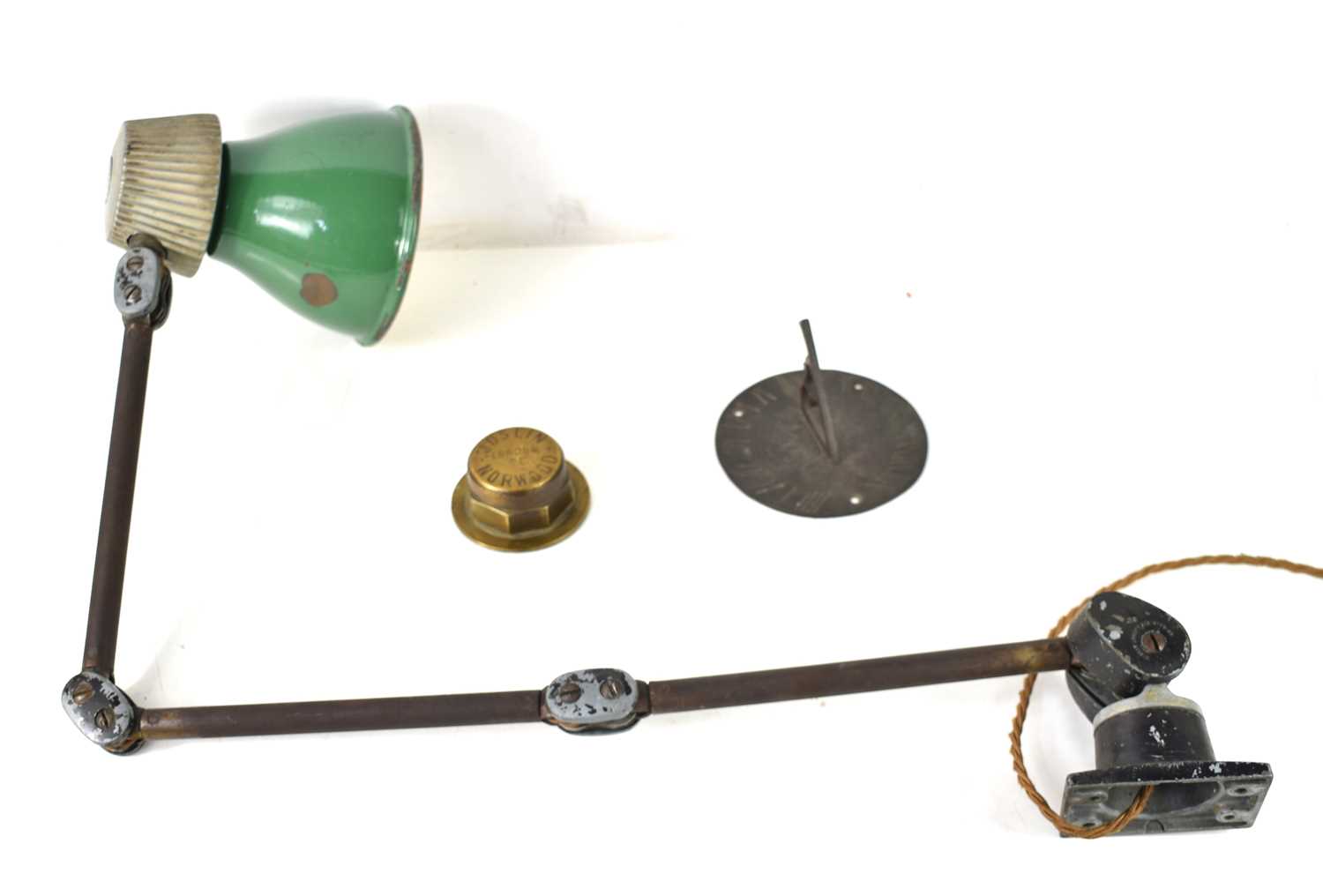 A vintage BHI Lo-Vo engineers Anglepoise light with enamel shade together with a brass sundial and a