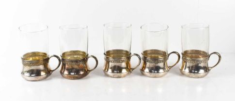 A set of five Continental 800 silver tea glasses or podstakannik each of squat bellied form,