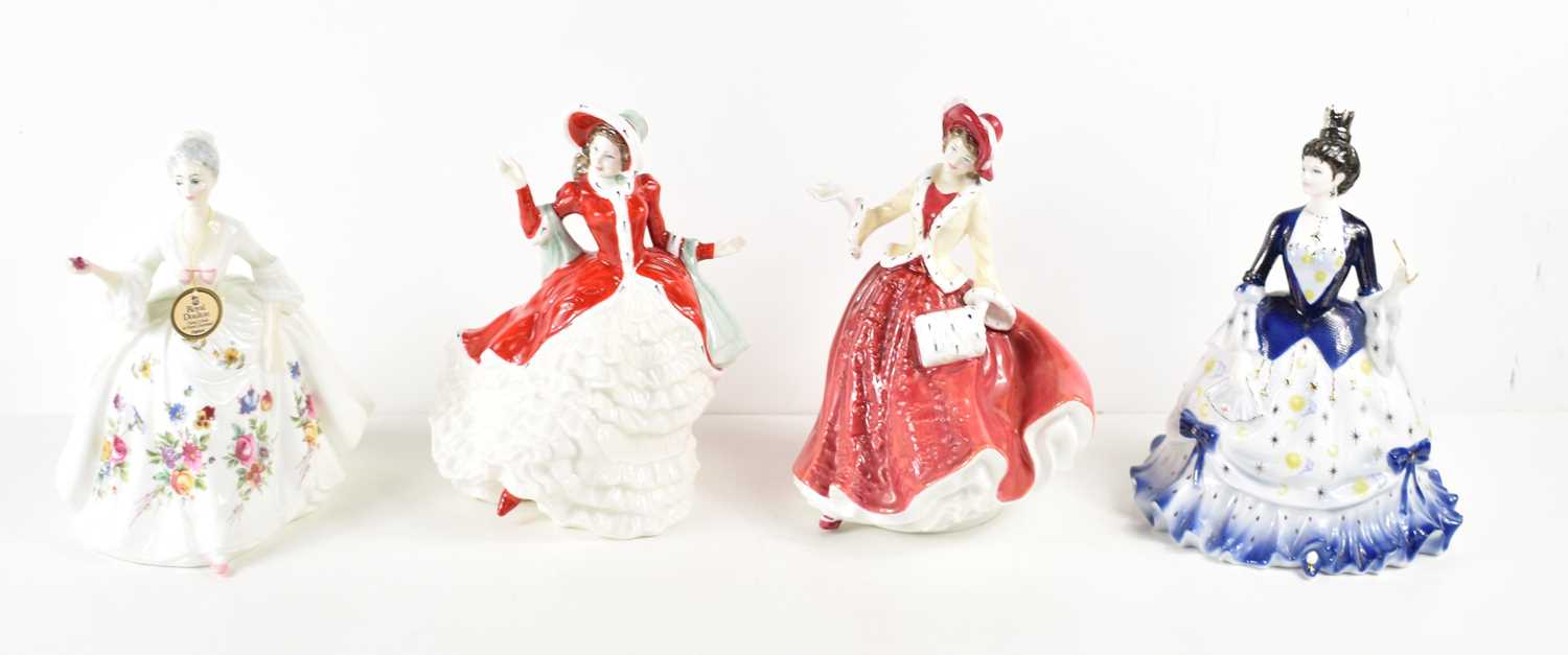 A group of Royal Doulton and Coalport ceramic figurines, comprising of Diana, Victorian Christmas,