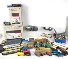 A group of 00 gauge model railway items to include Tri-ang signals and buildings, Hornby R950 master