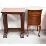 A 20th century mahogany nest of four graduated tables with bamboo style legs together with a burr
