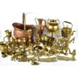 A large group of brass and copper ware to include candlesticks, vase, copper coal bucket, kettle,