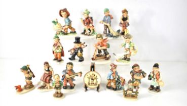 A collection of Goebel Hummel and Friedel Bavaria figurines to include Sympathetic Hunter, Boy