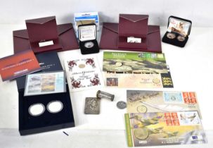 A group of coins to include two London Mint silver sovereigns, Queen Mary medal and stamps,