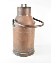 A vintage copper water or milk pail, with swing handle, 57cm high including handle.