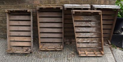 A group of vintage wooden crates.