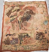 An 18th century French gros point tapestry, depicting huntsman and hound chasing a deer in woodland,