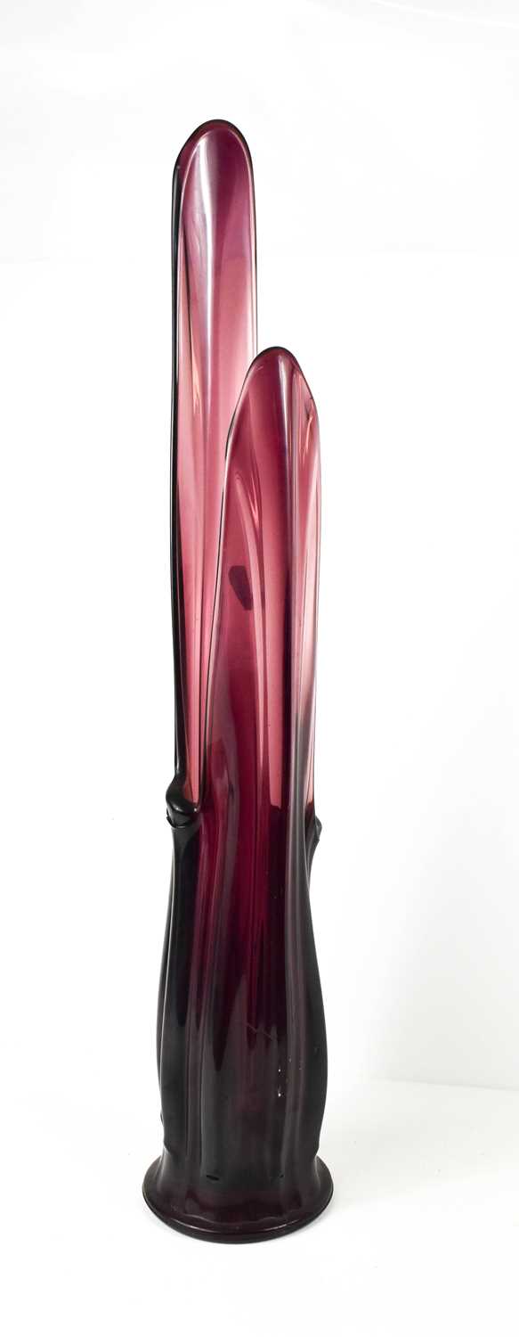 A vintage Art Deco style amethyst coloured glass vase, signed ST to the base, 56cm tall.