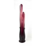 A vintage Art Deco style amethyst coloured glass vase, signed ST to the base, 56cm tall.