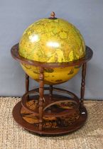 A 20th century Zoffoli drinks globe with hinged top concealing fitted interior, 60cm wide.