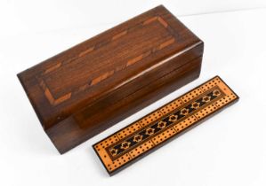 A 19th century Tunbridge ware cribbage board, with a geometric mosaic panel to the centre, and a