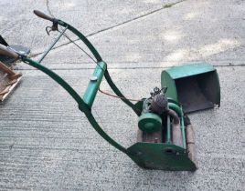 An early 20th century Ransomes, Sims and Jefferies of Ipswich Lightweight petrol lawnmower,