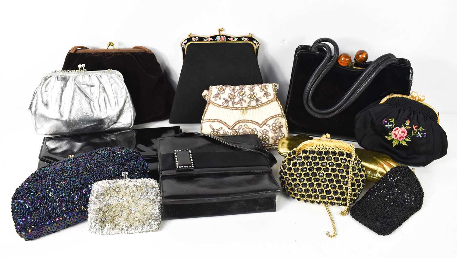 A selection of vintage handbags, including a Jane Shilton patent leather handbag with bead clasp,
