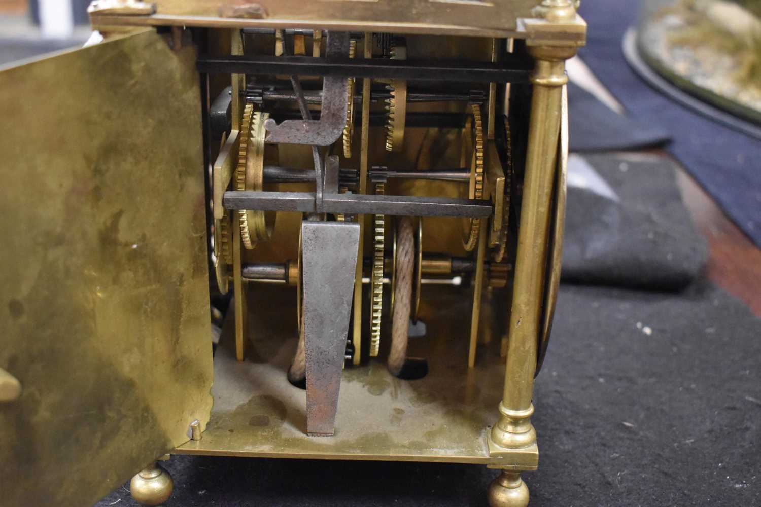 An 18th century Scott of London brass lantern clock, the Roman numeral chapter ring bordering a - Image 14 of 16