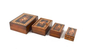 A group of four 19th century Tunbridge Ware boxes, including a playing card box, each decorated with