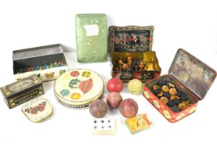 A group of vintage tins together with a Staunton style chess set, marbles, playing cards, cricket