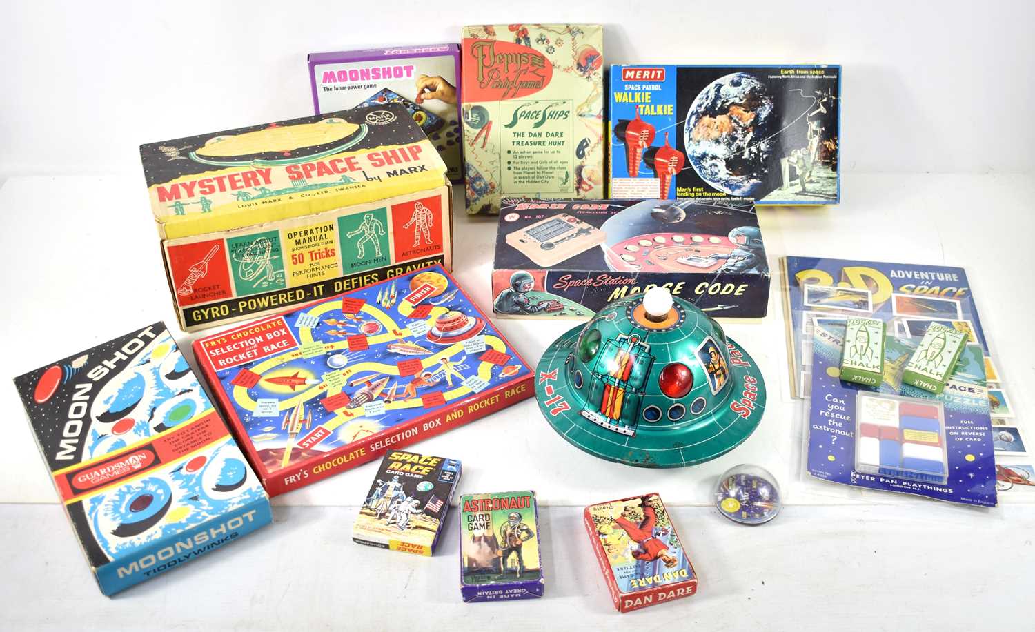 A group of vintage space toys to include a Louis Marx Mystery Space Ship in the original box, a