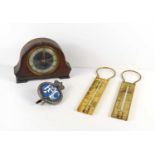 A group of collectables to include a Glen oak cased mantle clock, enamel RAC car badge and two brass