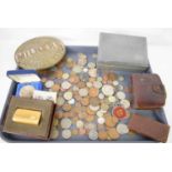 A selection of coins and collectables to include a Duckhams presentation medallion, commemorative