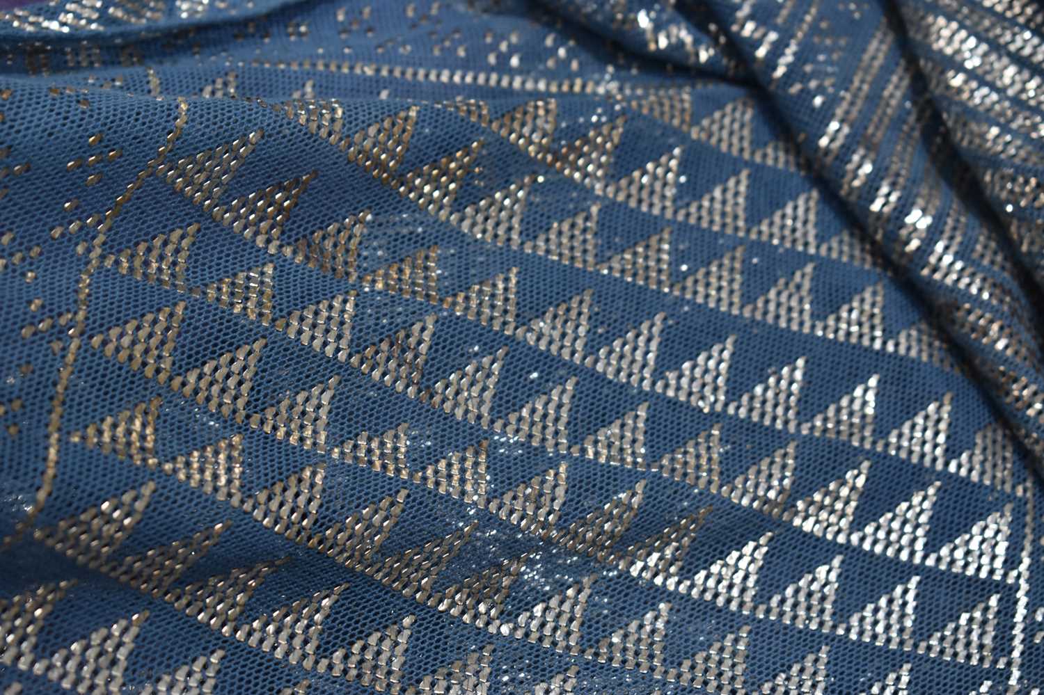 An Art Deco Egyptian Assuit shawl, the blue linen net with hammered silver abstract design, 78 by - Image 2 of 7