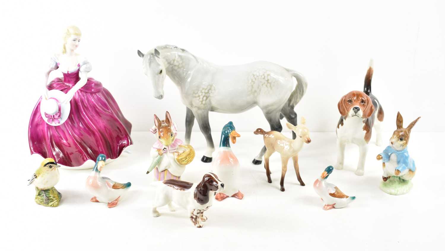 A quantity of Beswick animal figurines to include a "Wendover Billy" beagle, Palomino horse,