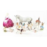 A quantity of Beswick animal figurines to include a "Wendover Billy" beagle, Palomino horse,