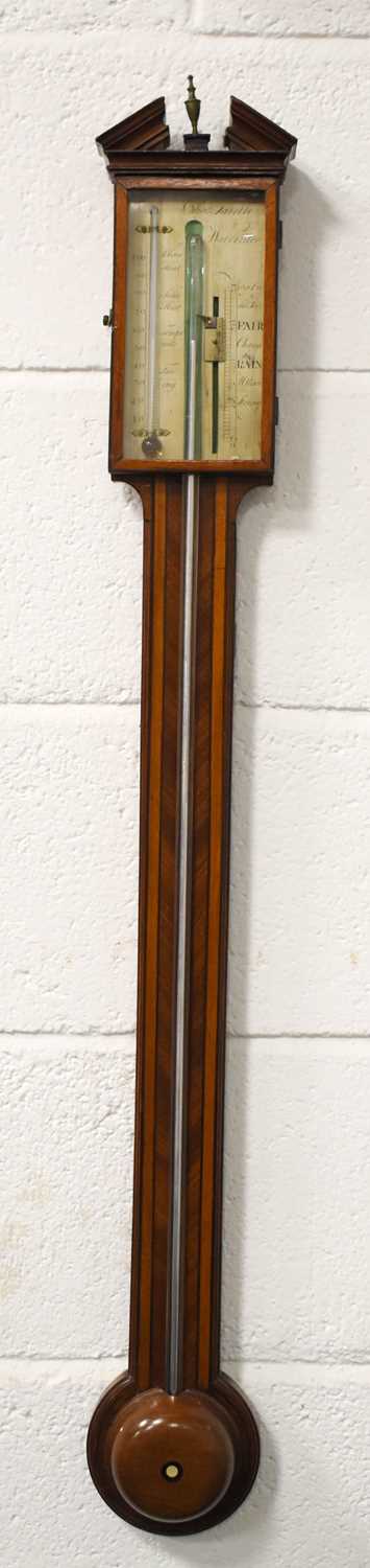 A Georgian mahogany stick barometer by Charles Tarelli, the rectangular silvered dial signed Cs