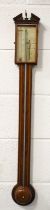 A Georgian mahogany stick barometer by Charles Tarelli, the rectangular silvered dial signed Cs