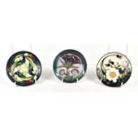 A group of three Moorcroft pin dishes, Gypsy design by Rachel Bishop, Ankerwycke Yew by Emma Bossons