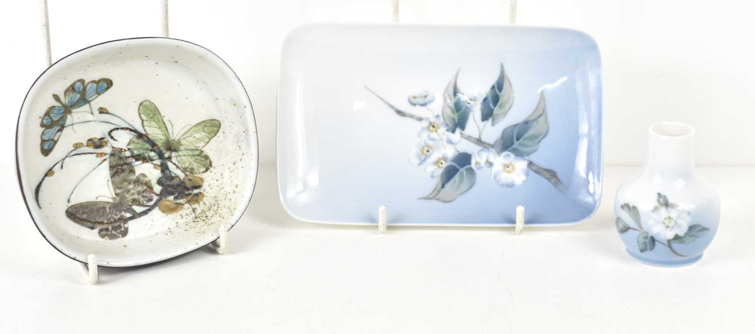 A Royal Copenhagen dish decorated with butterflies by Nils Thorsson, 12cm by 11cm together with a