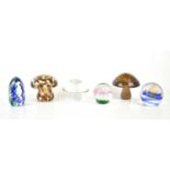 A group of three mushroom shaped and three further glass paperweights, by makers including Wedgwood,