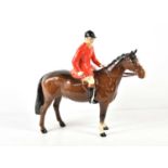 A Beswick huntsman on standing bay horse, model number 1501, designed by Arthur Geddington in