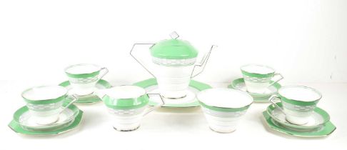 A Paragon Art Deco tea set, of typical stepped conical form, with pale green banded decoration and
