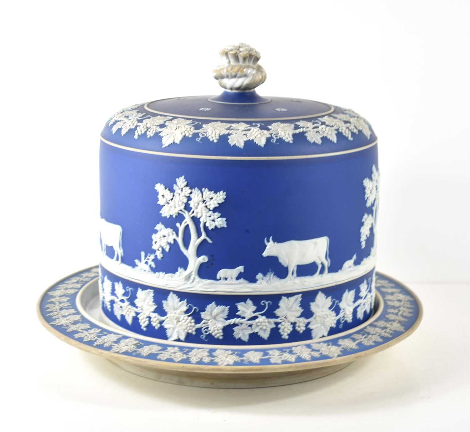 A 19th century jasper ware Stilton or cheese dome, possibly by James Dudson, the deep blue ground