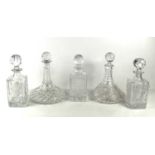 Two similar cut glass ships decanters, one with original Harrods labels still present, 26cm high,