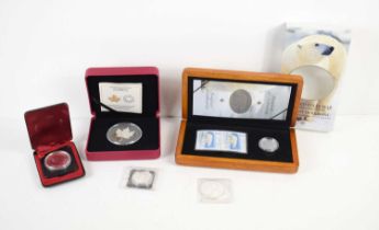 A group of Canadian silver commemorative coins to include a 2004 limited edition Proud Polar Bear $2