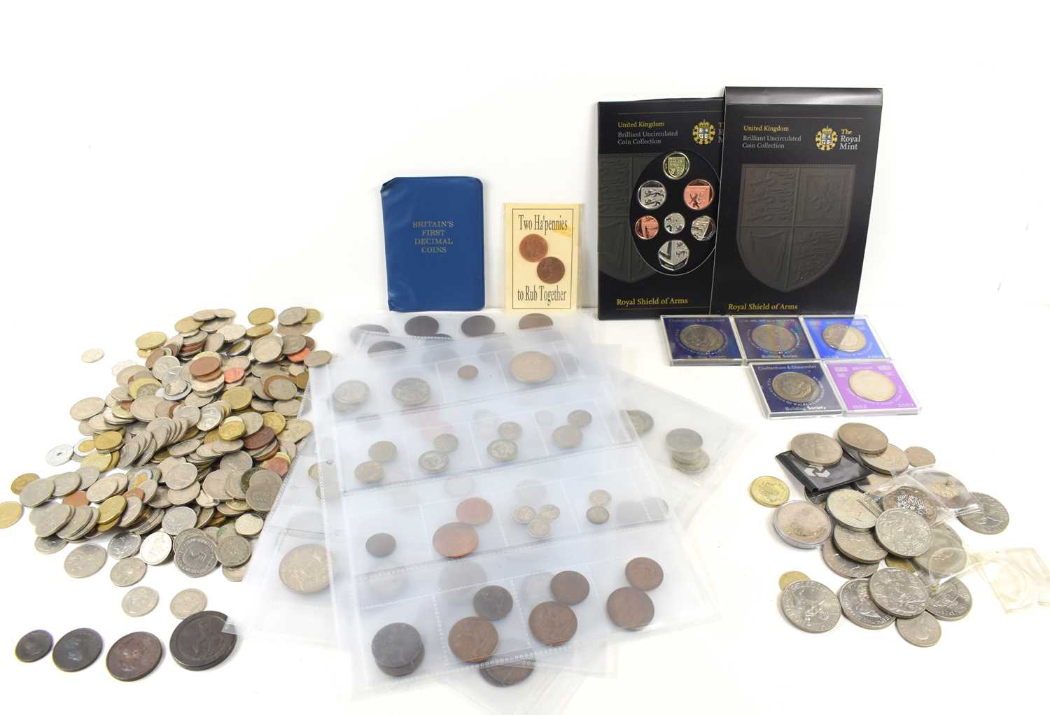 A large collection of GB and worldwide coinage, to include commemorative crowns, some silver