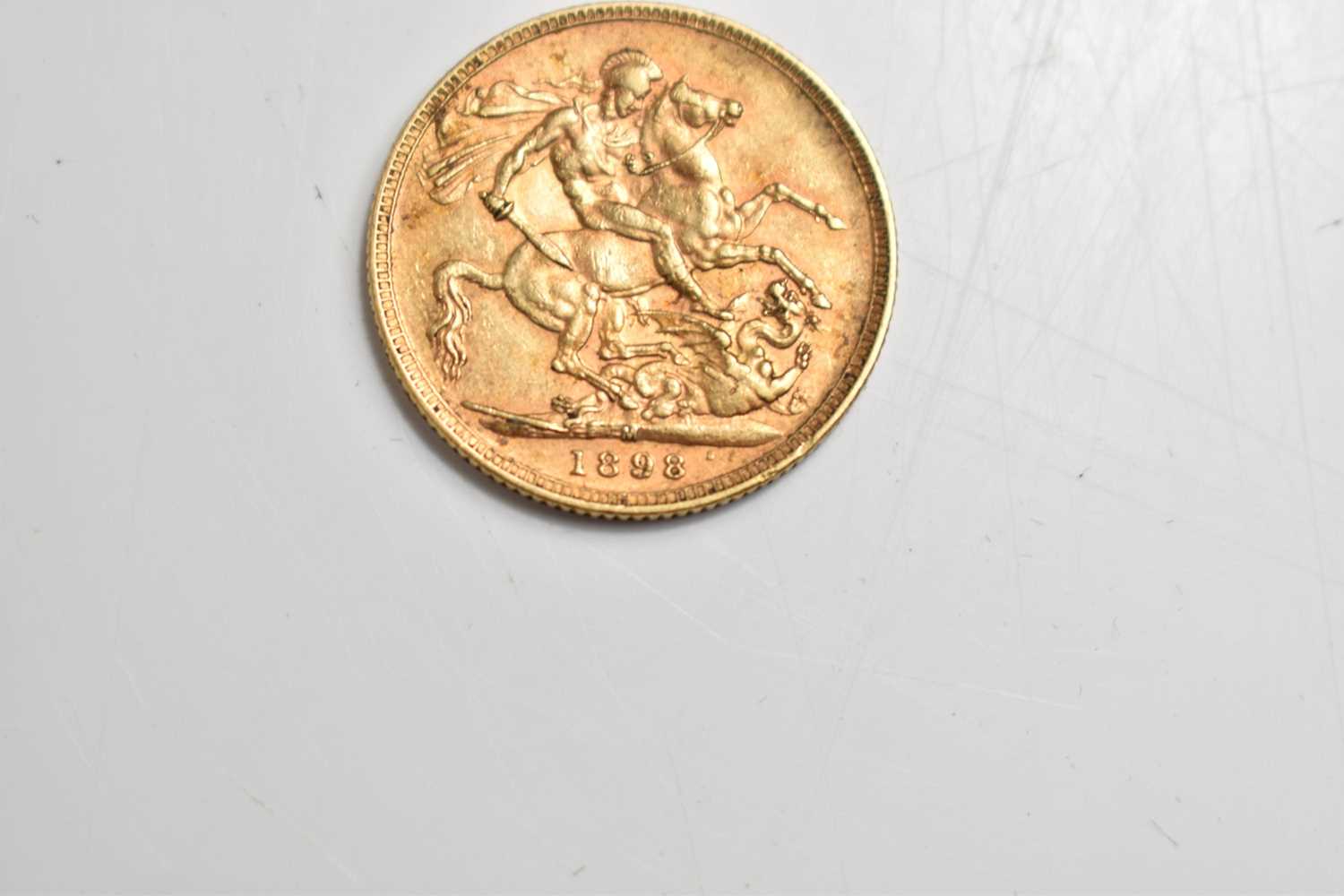 A Queen Victoria full gold sovereign, veiled head, Melbourne mint mark, dated 1898. - Image 3 of 3