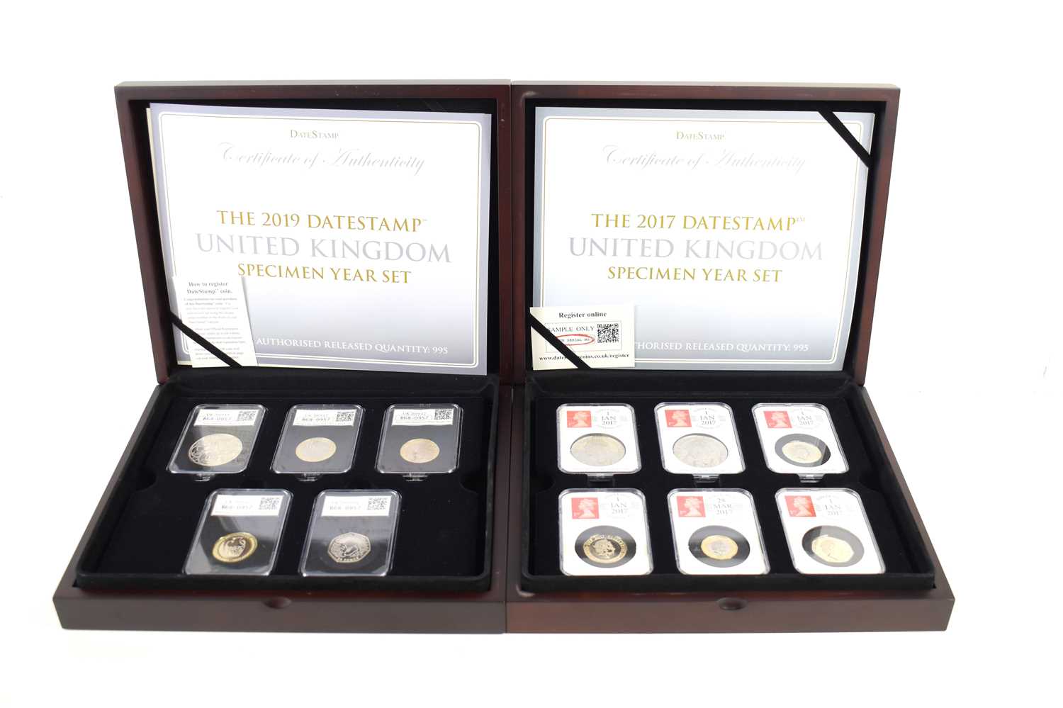 Two Queen Elizabeth II 2017 and 2019 United Kingdom DateStamp specimen coin sets, in capsules and
