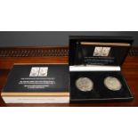 Two Crowns of Two Kings Coin set, the 1935 Silver Jubilee silver crown of King George V, and the