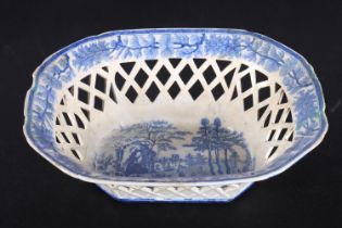 Davenport blue and white pottery basket with reticulated lattice work band, decorated with