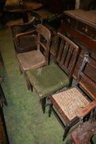 Four antique chairs.