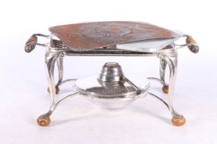 White metal warming stand with burner, retailed by Harrods of London, 28cm across the handles.